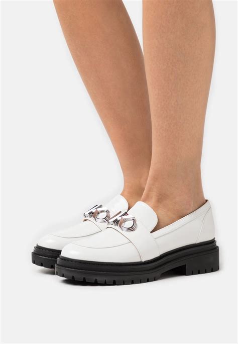 michael kors white slip ons|Michael Kors slip on shoe.